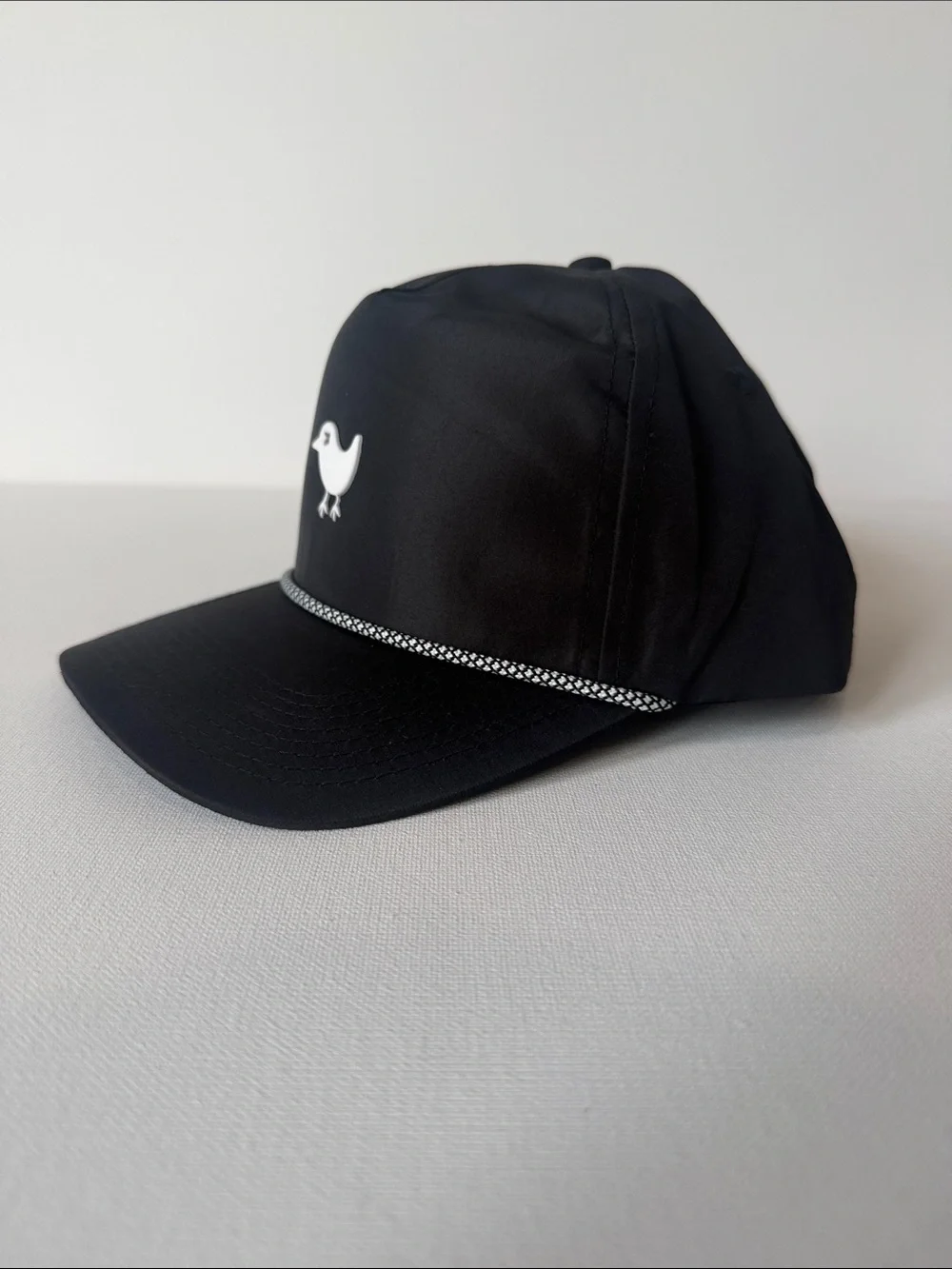 Bad Birdie Black Cap with White Bird Emblem